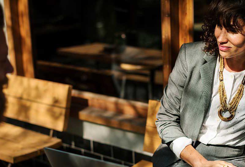 Business Man and Woman at Table